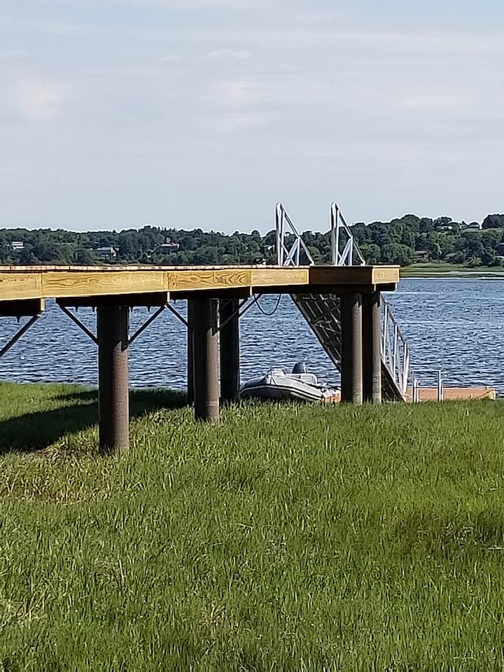 Wood Pier with fiberglass pilings built by Ramsey Marine in Ipswich, MA