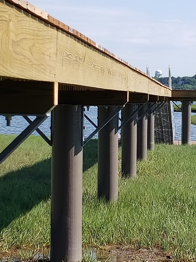 Wood Pier with fiberglass pilings built by Ramsey Marine in Ipswich, MA